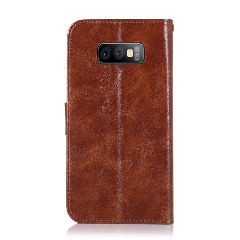 Kotelot Samsung Galaxy S10e Vintage Nahkaefekti Hihnalla