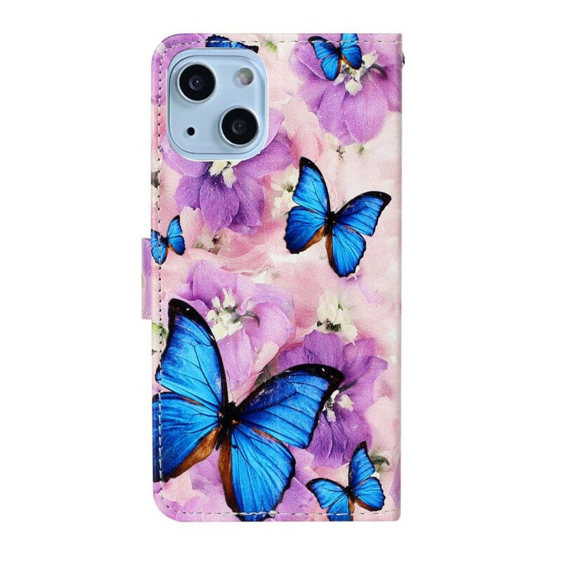 Flip Kotelot iPhone 13 Mini Sinisiä Perhosia Kukissa