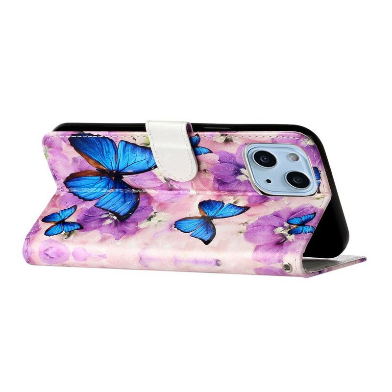 Flip Kotelot iPhone 13 Mini Sinisiä Perhosia Kukissa