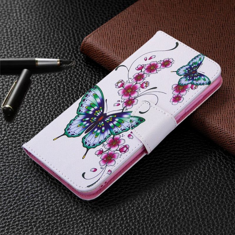 Kotelot Samsung Galaxy M11 Tummansininen Magenta Kuninkaat Perhosia